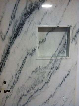 marble shelf in marble shower install